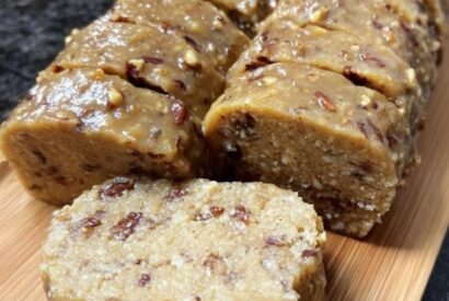 Thumbnail for Classic Southern Pecan Log A Sweet, Nostalgic Candy Made with a Fluffy Vanilla Center, Chewy Caramel, and Crunchy Pecans